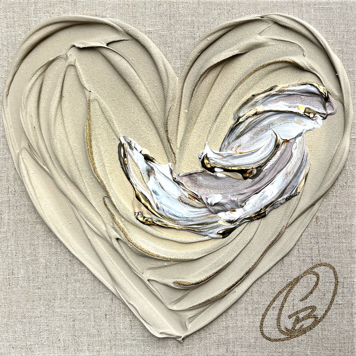 Le coeur sur le sable